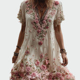 Vintažo stiliaus suknelė su trumpomis rankovėmis ir elegantiškų gėlių siuvinėjimu