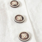 Trumpas rankovės marškinėlis su mygtukais