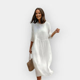 Suknelė su Pabrėžiančiu Dizainu Pilvui